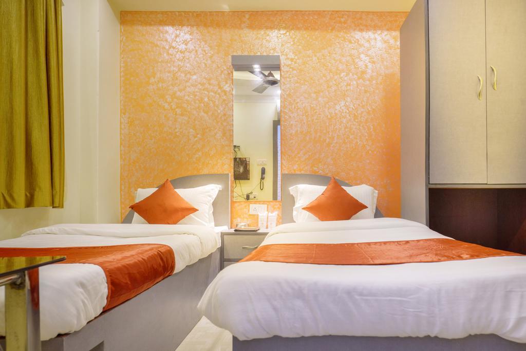 Golden Heaven Hotel Калькутта Номер фото